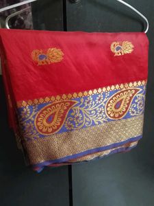 Vibrant Red Silk Saree with Peacock Motifs