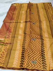 Elegant Yellow Saree with Intricate Design