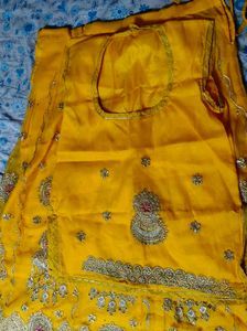 Embroidered Yellow Rajasthani poshak.