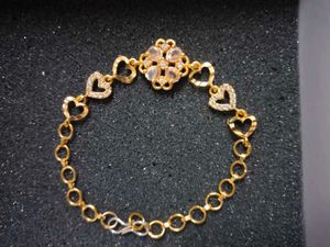 Gold Plated Bracelet with Heart Charms