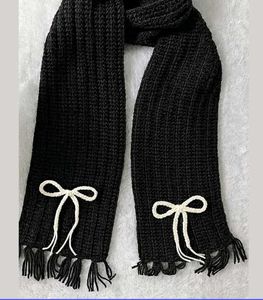 Chic Black Knit Scarf with Bow Detail