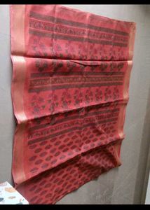 Beautiful Red Saree with Intricate Black Motifs