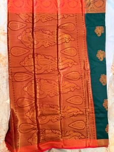 Elegant Dark Green Saree with Reddish maroon Borde