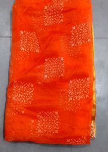 Elegant Orange Saree with White Motifs
