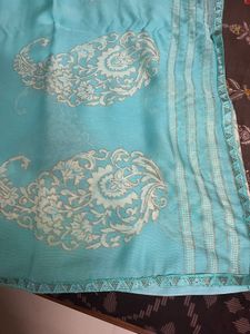 Elegant Teal Saree with Intricate Design