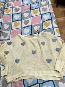 cream sweater