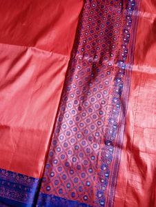 Vibrant pink orange Saree with Blue Border