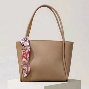 Stylish Beige Tote Bag with Scarf Accent