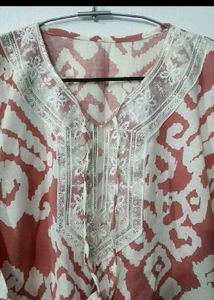 Stylish Printed Kurta with Embellished Neckline