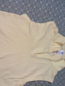 Sleeveless Yellow Polo top