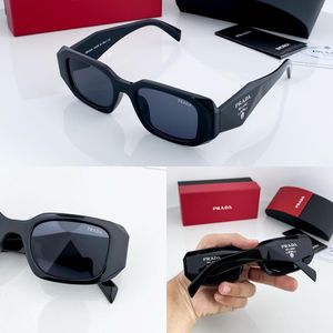 Prada Sunglasses - Black