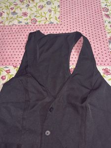 Sleek Black Sleeveless Vest Top