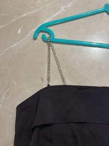 Chic Black Off-Shoulder Top with Chain Detail