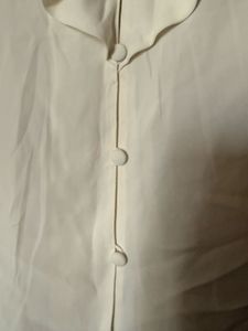 Elegant Cream Ruffled Blouse