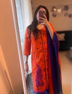 Vibrant Orange Kurta Set with Peacock Embroidery