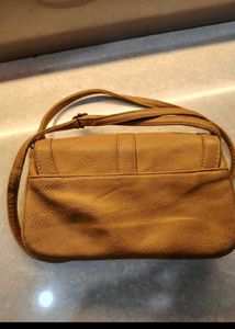 mustard yellow sling bag