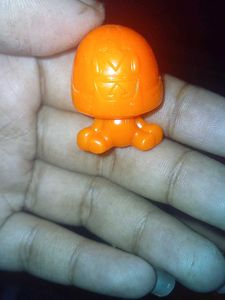 Vintage Toy Character with Wheels