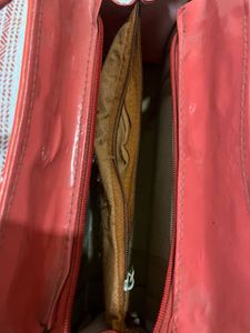 Red Handbag with Embellishments
