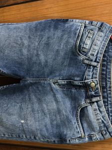 Ripped Hem Jeans
