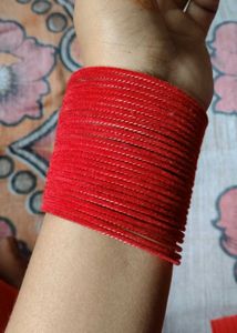 Elegant Gold-Tone Bangles with Tassel Charms