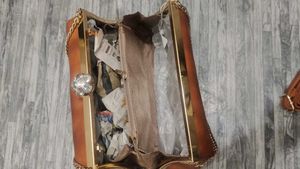 Elegant Brown Clutch with Chain Detail