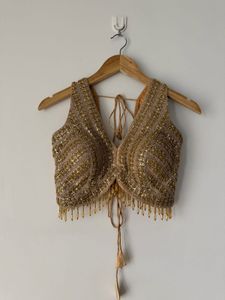 Embellished V-Neck Sleeveless Blouse