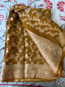 Elegant Brown Saree with Intricate Motifs