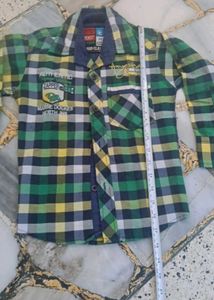21. Boys Plaid Button-Up Shirt