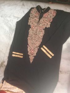 golden and red embroidery black kurti