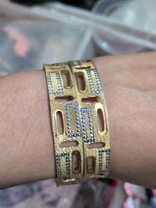 Elegant Gold Bangles with Intricate Design