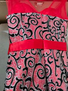 Glittery Red Gown With Black Detailing