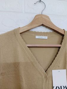 Sleeveless Button-Down Top