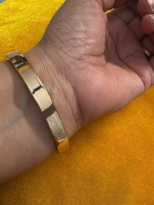 Elegant Gold Tone Bangle