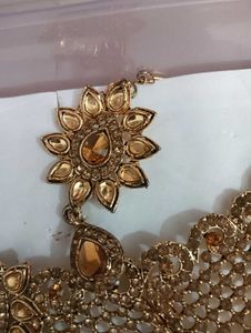 necklace, earing and 1 mang tika
