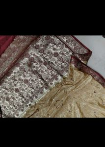 Elegant Gold and Maroon Silk saree
