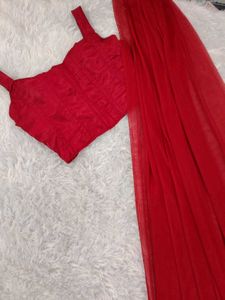 Vibrant Red Saree with Matching Corset Blouse