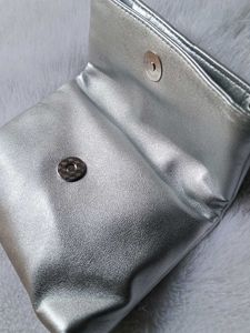 Clinique silver metallic foldable clutch 💕♥️