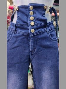 High Waist Ripped Jeans with Button upRings