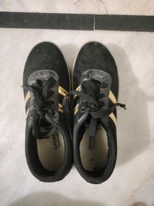 Black Shoes With Golden Strips