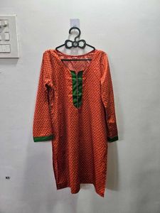 Orange Printed Kurta with Green Neckline