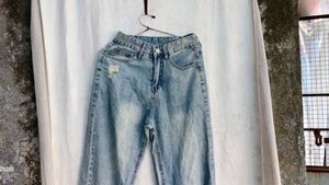 I. Light Wash Ripped Jeans