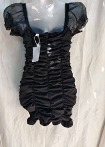 713. Chic Black Ruched Mini Dress