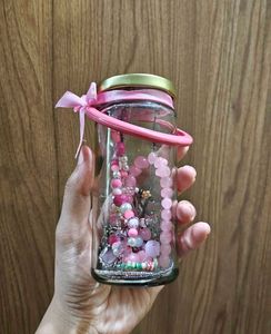 Assorted Pink Beaded Jewelry Jar