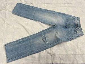 washed out distressed Blue baggy Jeans