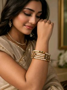 Elegant Gold Tone Bangles with Pearl Accents