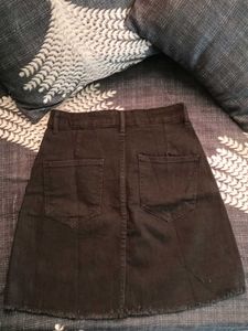 Black denim skirt