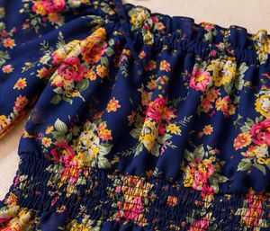 Cute Navy Floral Smocked Peplum Top