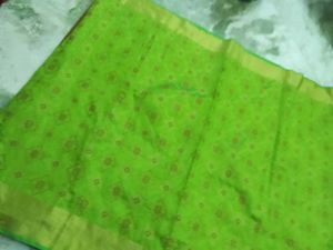 Vibrant Green Saree with Golden Border