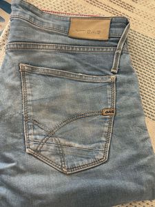 Light Wash Distressed Denim Jeans