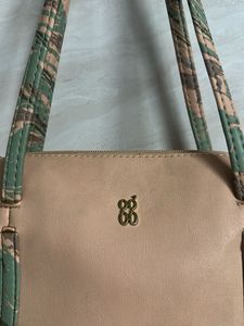 Stylish Beige Tote Bag with Green Accents